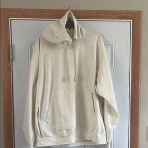 Nike Standard issue men’s XLT cream colored hoodie.